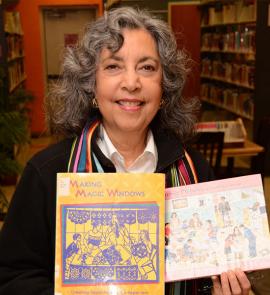 Hispanic author with books