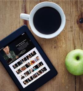 iPad and coffee cup on a table